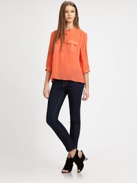 An elegantly tailored blouse shaped with soft pleating at the shoulders, all in sumptuous silk georgette.Band collarButton-down placketThree-quarter sleevesChest pocketsStraight hemSlightly gathered backAbout 25 from shoulder to hemSilkDry cleanImportedModel shown is 5'10 (177cm) wearing US size Small. An elegantly tailored blouse shaped with soft pleating at the shoulders, all in sumptuous silk georgette.Band collarButton-down placketThree-quarter sleevesChest pocketsStraight hemSlightly gathered backAbout 25 from shoulder to hemSilkDry cleanImportedModel shown is 5'10 (177cm) wearing US size Small.