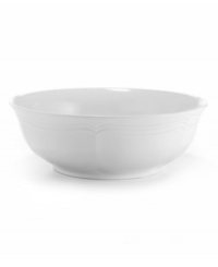 A gently scalloped edge in hardy stoneware gives the French Country cereal bowl an effortless grace that's ideal for every day. From Mikasa.