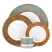 The luxurious, museum-quality floral motifs in Gilded Tapestry create a dramatic presentation sure to command attention at any dinner party. Warm ember hues and golden tones are offset by cool blue accents on this compelling pattern. Unique layering of of each place setting piece atop the other highlights the common threads of color and metallics while creating a sophisticated style. The luxurious, museum-quality floral motifs in Gilded Tapestry create a dramatic presentation sure to command attention at any dinner party. Warm ember hues and golden tones are offset by cool blue accents on this compelling pattern. Unique layering of of each place setting piece atop the other highlights the common threads of color and metallics while creating a sophisticated style.