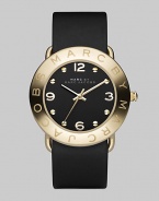 Streamlined timekeeping with a polished goldplated finish and fine leather strap.Quartz movement Water resistant to 3 ATM IP (ionic plated) gold bezel with engraved logo Stainless steel round case, 36mm, (1.42) Black dial IP gold numeral and hour markers Leather strap, 20mm, (.79) Imported 