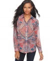 INC's floaty button-front petite shirt offers a traditional look with a modern twist, thanks to a paisley print in a bold color palette. (Clearance)