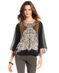 Luxe touches abound on Alfani's top, outfitted with flowing sheer sleeves, an animal-print that descends to an opulent scroll pattern and a chic bubble hem. Luxe touches abound on Alfani's top, outfitted with flowing sheer sleeves, an animal-print that descends to an opulent scroll pattern and a chic bubble hem.