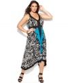 Land one of spring's hottest looks with INC's sleeveless plus size maxi dress, punctuated by a handkerchief hem.