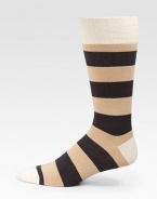 Bold stripes add color and warmth underfoot.Mid-calf heightRibbed cuff72% cotton/26% nylon/2% spandexMachine washImported