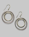 From the Thoroughbred Collection. Gracefully graduated circles, one of cabled sterling silver, one of 18k gold. Sterling silver and 18k yellow gold Drop, about 1½ Diameter, about 1 Ear wire