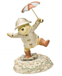 Inspired by the classic film starring Gene Kelly, Winnie the Pooh takes his turn at stomping through the rainy streets in this charming Disney figurine. Accented with 24-karat gold and measures 7.75. Inspired by the classic film starring Gene Kelly, Winnie the Pooh takes his turn at stomping through the rainy streets in this charming Disney figurine. Accented with 24-karat gold and measures 7.75.