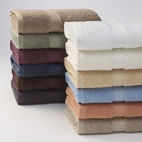 Extra long looped fibers of premium Egyptian cotton create a towel that is the ultimate in luxury: enhanced softness, excellent drying power, and durability. Classic double pintuck design with refined twill edges and a textured center panel. Extra long looped fibers of premium Egyptian cotton create a towel that is the ultimate in luxury: enhanced softness, excellent drying power, and durability. Classic double pintuck design with refined twill edges and a textured center panel.