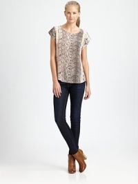 Bold snake-print adds an exotic spin to this effortless silk blouse.ScoopneckCap sleevesShirttail hemPullover styleCenter back zipperSilkDry cleanImportedModel shown is 5'11 (180cm) wearing US size Small. Bold snake-print adds an exotic spin to this effortless silk blouse.ScoopneckCap sleevesShirttail hemPullover styleCenter back zipperSilkDry cleanImportedModel shown is 5'11 (180cm) wearing US size Small.