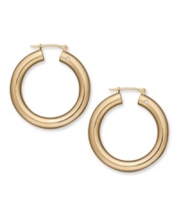 Diamond accents add the dazzle to a traditional pair of hoop earrings. Crafted in 14k gold, by Signature Gold™. Approximate diameter: 1-1/8 inches. Diamond accents add the dazzle to a traditional pair of hoop earrings. Crafted in 14k gold, by Signature Gold™. Approximate diameter: 1-1/8 inches.