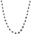 An elegant combination. Faceted black diamond beads (13 ct. t.w.) enhance the appeal of this link necklace, set in 14k gold. Approximate length: 17 inches.