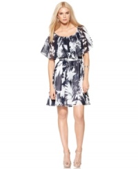An abstract leaf print adds a graphic appeal to this floaty, feminine Vince Camuto chiffon dress -- perfect for a spring style! An abstract leaf print adds a graphic appeal to this floaty, feminine Vince Camuto chiffon dress -- perfect for a spring style!