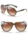 Hit the beach in retro-inspired aviator sunglasses with metal double bar design and metal accents at temples.