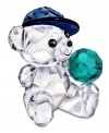 What a catch! Kris Bear is all suited up for little league, wearing a blue baseball hat in this crystal figurine for Swarovski collectors.