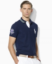 Designed exclusively for Ralph Lauren's collection celebrating the Wimbledon Championships, an iconic short-sleeved polo shirt is cut for a trim, modern fit from a breathable cotton-blend mesh for athletic style.