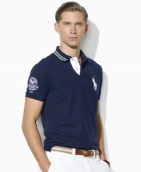 Designed exclusively for Ralph Lauren's collection celebrating the Wimbledon Championships, an iconic short-sleeved polo shirt is cut for a trim, modern fit from a breathable cotton-blend mesh for athletic style. Designed exclusively for Ralph Lauren's collection celebrating the Wimbledon Championships, an iconic short-sleeved polo shirt is cut for a trim, modern fit from a breathable cotton-blend mesh for athletic style.