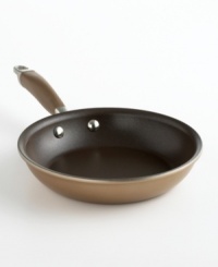 The ideal omelette or fry pan, Anolon's stunning skillet lends an impressive air to any kitchen. Crafted in bronze-hued, hard-anodized aluminum with an exclusive nonstick coating, this pan promotes healthier meal preparation done with sumptuous style. Limited lifetime warranty. The ideal omelette or fry pan, Anolon's stunning skillet lends an impressive air to any kitchen. Crafted in bronze-hued, hard-anodized aluminum with an exclusive nonstick coating, this pan promotes healthier meal preparation done with sumptuous style. Limited lifetime warranty.