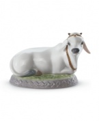 No ordinary moo cow, this handcrafted Lladro figurine puts one the world's most-sacred animals on an elegant porcelain pedestal.