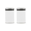 These salt and pepper shakers translate Kate Spade's signature contrast stitching with simple black banding and fine white dots.