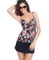 A lively floral print blooms onto Coco Reef's halter tankini top, accented by an O-ring-- get set for the sunshine!