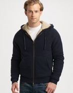 The ultimate in winter warmth and style marries the easy comfort of a cozy, lined cotton knit hoodie.Two-way zip frontAttached drawstring hoodKangaroo pocketsLining: polyesterCottonMachine washImportedAdditional Information Men's Shirts & Sweaters Size Guide 