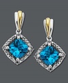 Dramatic dazzle. Cushion-cut blue topaz (2 ct. t.w.) and sparkling diamond accents stun on these unique diamond-shaped drop earrings. Crafted in 14k gold and sterling silver. Approximate drop: 3/4 inches.