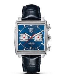 In 1969, TAG Heuer broke with tradition by creating the first square-cased, water-resistant watch in the history of watchmaking. Powered by the famous Chronomatic Calibre 11, the Monaco is also the world's first automatic chronograph. With blue dial and a polished steel bezel. Features a date window. In 1969, TAG Heuer broke with tradition by creating the first square-cased, water-resistant watch in the history of watchmaking. Powered by the famous Chronomatic Calibre 11, the Monaco is also the world's first automatic chronograph. With blue dial and a polished steel bezel. Features a date window.