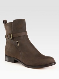 Step out in this must-have silhouette of rich oiled leather, topped with an adjustable strap and metal buckle. Stacked heel, 1 (25mm)Oiled leather upperPull-on styleLeather lining and solePadded insoleImported Step out in this must-have silhouette of rich oiled leather, topped with an adjustable strap and metal buckle. Stacked heel, 1 (25mm)Oiled leather upperPull-on styleLeather lining and solePadded insoleImported