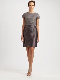 A delicate, sequined lace overlay and a slender matching belt define this metallic design.Jewel necklineCap sleevesSequined lace overlayIncluded beltBack ventConcealed back zipFully linedAbout 22 from natural waistPolyester/metallic fiberDry cleanMade in USA of imported fabricModel shown is 5'11 (180cm) wearing US size 2. A delicate, sequined lace overlay and a slender matching belt define this metallic design.Jewel necklineCap sleevesSequined lace overlayIncluded beltBack ventConcealed back zipFully linedAbout 22 from natural waistPolyester/metallic fiberDry cleanMade in USA of imported fabricModel shown is 5'11 (180cm) wearing US size 2.