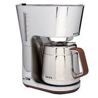 Rise and shine with this sleek, high gloss stunner. Crafted of stainless steel and chrome, and accented with natural wood, this 10-cup brewer is equal parts beauty and brains. A 10-cup thermal carafe keeps coffee warm for hours and an anti-drip function will keep your countertops as gleaming as your coffee machine. Rise and shine with this sleek, high gloss stunner. Crafted of stainless steel and chrome, and accented with natural wood, this 10-cup brewer is equal parts beauty and brains. A 10-cup thermal carafe keeps coffee warm for hours and an anti-drip function will keep your countertops as gleaming as your coffee machine.