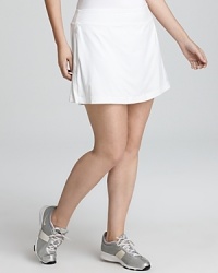 Refresh your workout repertoire with a crisp white Nike skirt, made with Dri-FIT technology to wick away moisture. Refresh your workout repertoire with a crisp white Nike skirt, made with Dri-FIT technology to wick away moisture.