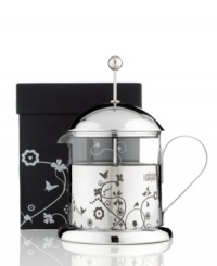 Add instant character to your kitchen with this attractive and unique screen-printed tea pot. The whimsical floral and butterfly pattern stands out on the stainless steel frame making it a great gift for a friend or the perfect present... to yourself. 1-year warranty. Add instant character to your kitchen with this attractive and unique screen-printed tea pot. The whimsical floral and butterfly pattern stands out on the stainless steel frame making it a great gift for a friend or the perfect present... to yourself. 1-year warranty.