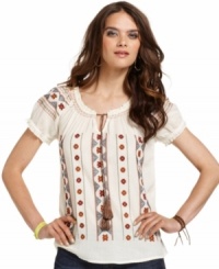 A vintage look for the modern bohemian -- get it with this Lucky Brand Jeans peasant top. Featuring needlepoint embroidery and a chic tassel tie at the neckline, it's all about the details. A vintage look for the modern bohemian -- get it with this Lucky Brand Jeans peasant top. Featuring needlepoint embroidery and a chic tassel tie at the neckline, it's all about the details.