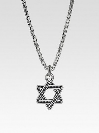 A fine chain holds a Star of David pendant hand-forged with dimensional detail in sterling silver. Sterling silver Chain length, about 20 Lobster clasp Made in USA 