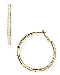 kate spade new york's ridged enamel and gold-plated hoops will make a bold addition to your jewel box. Slip them in to dress up denim or round out a cocktail look. kate spade new york's ridged enamel and gold-plated hoops will make a bold addition to your jewel box. Slip them in to dress up denim or round out a cocktail look.