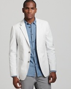 Casual elegance is effortless in a cotton-blend blazer from Theory.