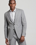 Classic tailoring gets a modern update with this muted gray sport coat from Theory.