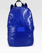 Lightweight carryall, crafted in a sleek, edgy design of packable polyester with leather logo accent patch.Zip closureTop handleAdjustable shoulder strapsInterior velcro pocketPolyester12W x 19H x 4DImported