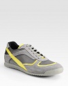 Sport around town in style in this lace-up sneaker crafted of fine canvas and leather.Padded insoleRubber soleImported