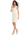 A delicate chain of lace daisies adorns INC's petite sheath dress! Perfect for all your summer parties and occasions.