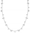 Perfect with a white blouse, even better doubled up with a little black dress. Long necklace by Lauren Ralph Lauren features clusters of silvertone beads. Crafted in mixed metal. Approximate length: 36 inches.