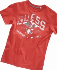 This Guess tee has a faded look and 1981 emblem giving it a cool vintage vibe. This Guess tee has a faded look and 1981 emblem giving it a cool vintage vibe.