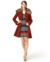 With a luxe faux-fur collar, this Bar III fit & flare coat features '70s styling for a super chic cold-weather look!