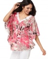 A vibrant print wakes up this fluid, relaxed tunic from Style&co. Lace trim adds a charming touch!