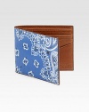 Bandana print adds a touch of whimsy and character to a classic billfold of textured leather.One billfold compartmentSix card slotsLeather4W x 4HImported