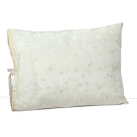This luxurious all-white bedding ensemble incorporates couture-inspired details - from intricate floral embroidery to elegant silk matelasse - for a feminine vision of modern romance. This luxurious all-white bedding ensemble incorporates couture-inspired details - from intricate floral embroidery to elegant silk matelasse - for a feminine vision of modern romance.