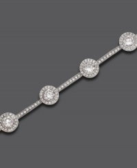 Delicate crystal accents are punctuated by gleaming round-cut cubic zirconia accents on this gorgeous silvertone mixed metal bracelet by Eliot Danori. Approximate length: 7 inches. Delicate crystal accents are punctuated by gleaming round-cut cubic zirconia accents on this gorgeous silvertone mixed metal bracelet by Eliot Danori. Approximate length: 7 inches.