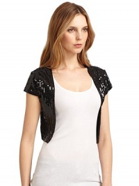 THE LOOKAllover sequinsCap sleevesOpen frontVent in hemTHE FITAbout 15 from shoulder to hemTHE MATERIALViscoseCARE & ORIGINHand washImportedModel shown is 5'10 (177cm) wearing US size Small. THE LOOKAllover sequinsCap sleevesOpen frontVent in hemTHE FITAbout 15 from shoulder to hemTHE MATERIALViscoseCARE & ORIGINHand washImportedModel shown is 5'10 (177cm) wearing US size Small.