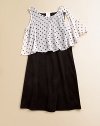 Itsy bitsy polka dots lend personality to a not-so-basic frock with an airy, layered-look bodice.RoundneckSleevelessPullover styleBodice has ruffled hemContrast: 68% polyester/30% rayon/2% spandexSolid: PolyesterHand washMade in USA