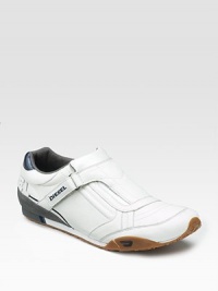 A new look for a favorite look, now with a grip-tape flap closure and logo detail along the heel. Leather lining Padded insole Rubber sole Imported A new look for a favorite look, now with a grip-tape flap closure and logo detail along the heel. Leather lining Padded insole Rubber sole Imported