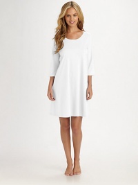 Luxurious versatility in a classic silhouette created from long-staple Egyptian Giza cotton, mercerized for ultra softness and a natural sheen.Scoop necklineThree-quarter sleevesUnderstated, shaped styleMercerized Egyptian Giza cotton interlockMachine washImportedAdditional Information Women's Modern Size Guide Luxurious versatility in a classic silhouette created from long-staple Egyptian Giza cotton, mercerized for ultra softness and a natural sheen.Scoop necklineThree-quarter sleevesUnderstated, shaped styleMercerized Egyptian Giza cotton interlockMachine washImportedAdditional Information Women's Modern Size Guide